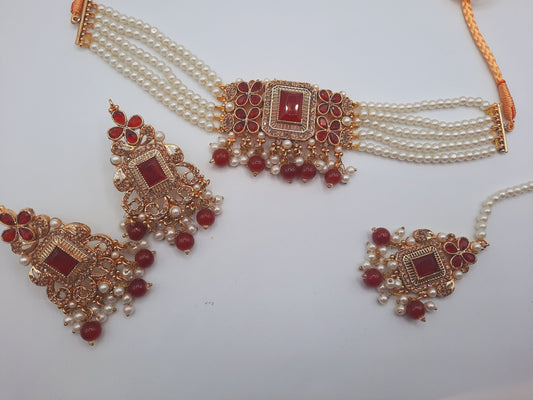 Anarkali choker set with guluband earrings and teeka in red color with gold plated tone - NATASHAHS
