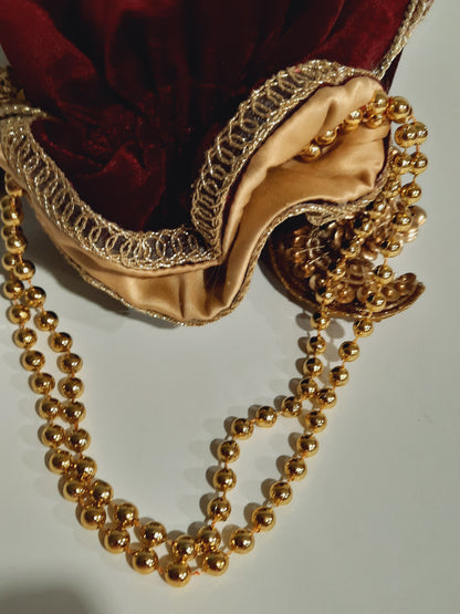 Red clutch for weddings and parties with golden chain