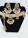White guluband choker with earrings and teeka