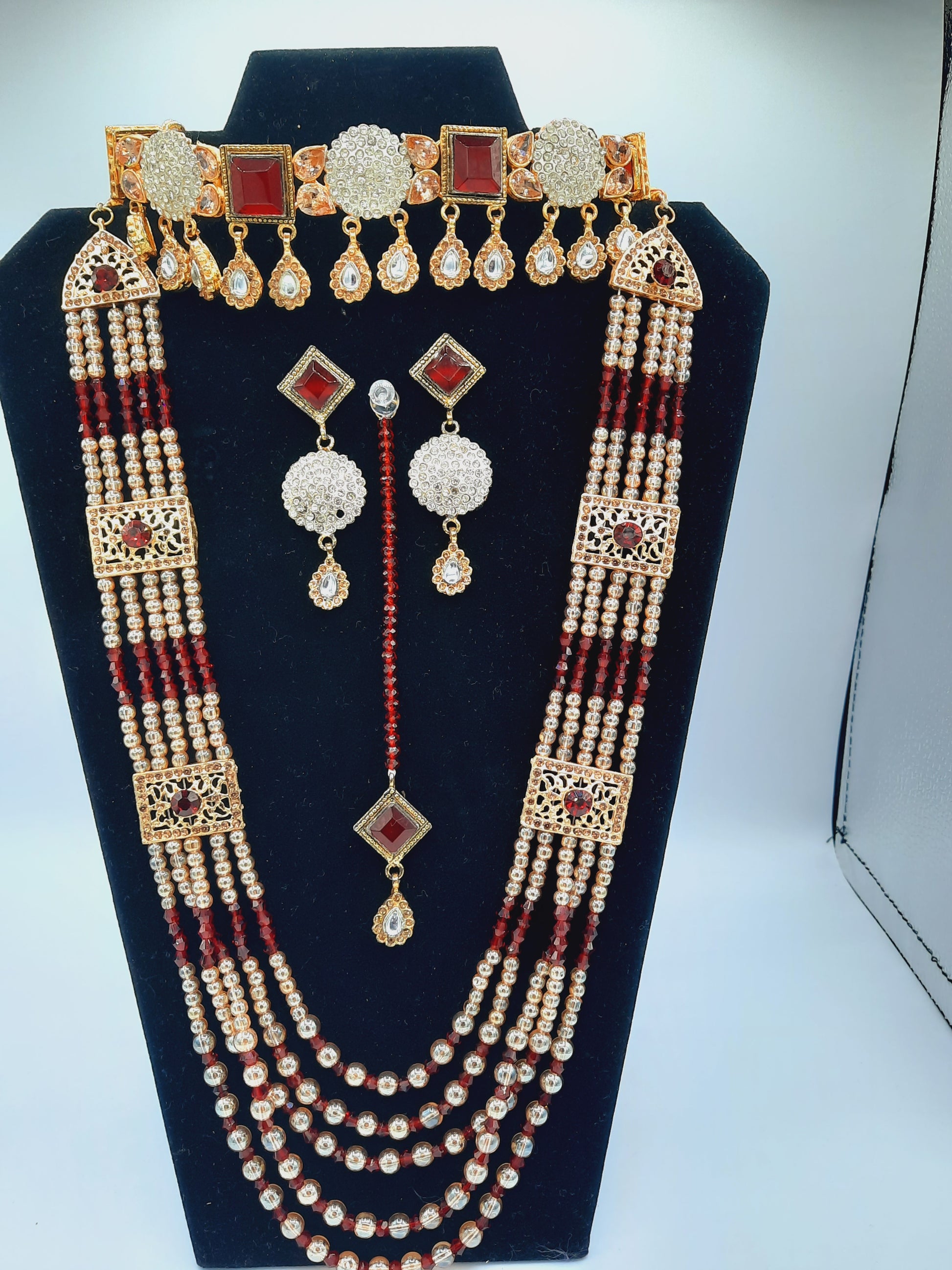 Bridal Jewelry in Golden base with maroon precious stones - NATASHAHS
