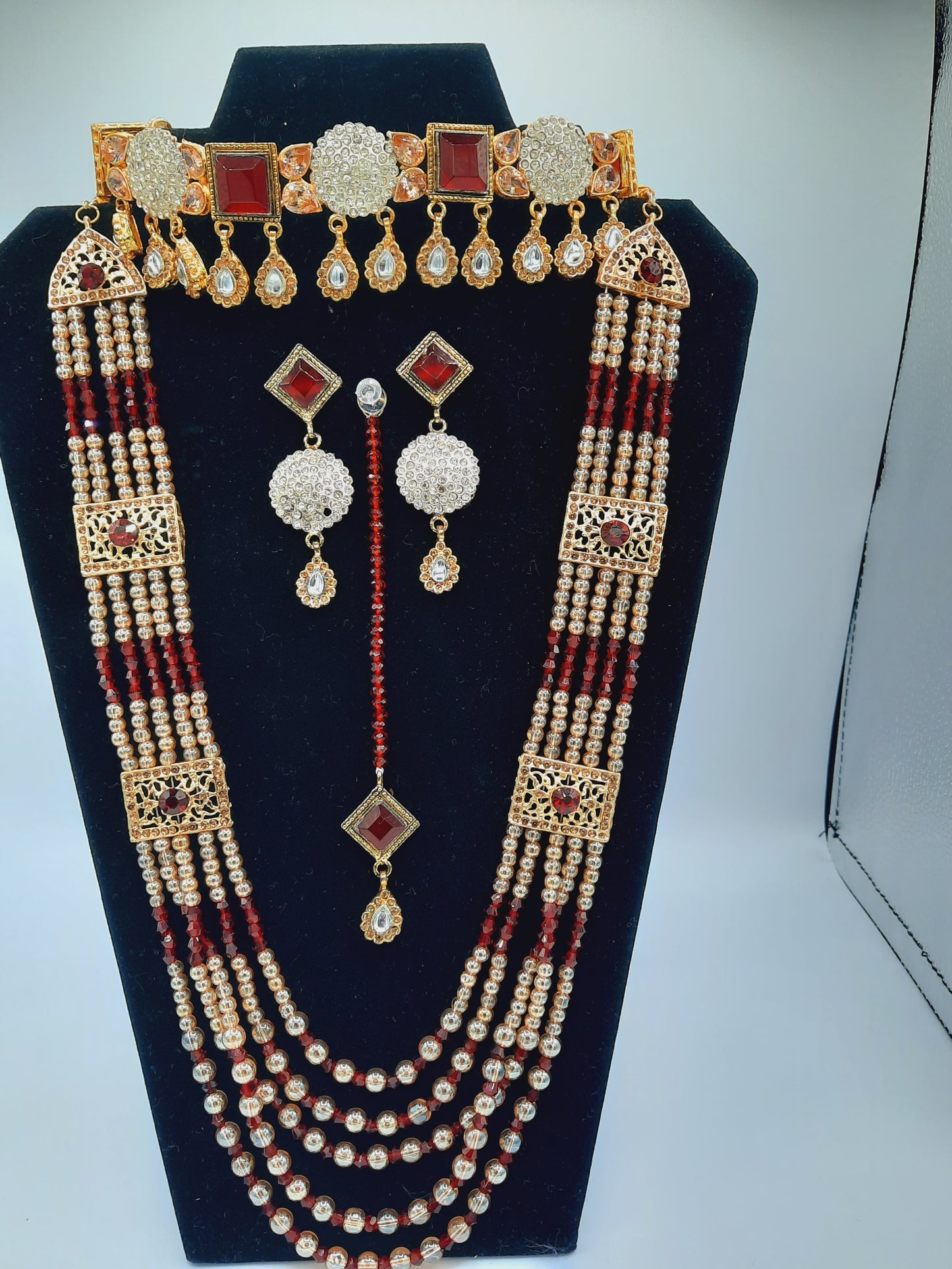 Bridal Jewelry in Golden base with maroon precious stones - NATASHAHS