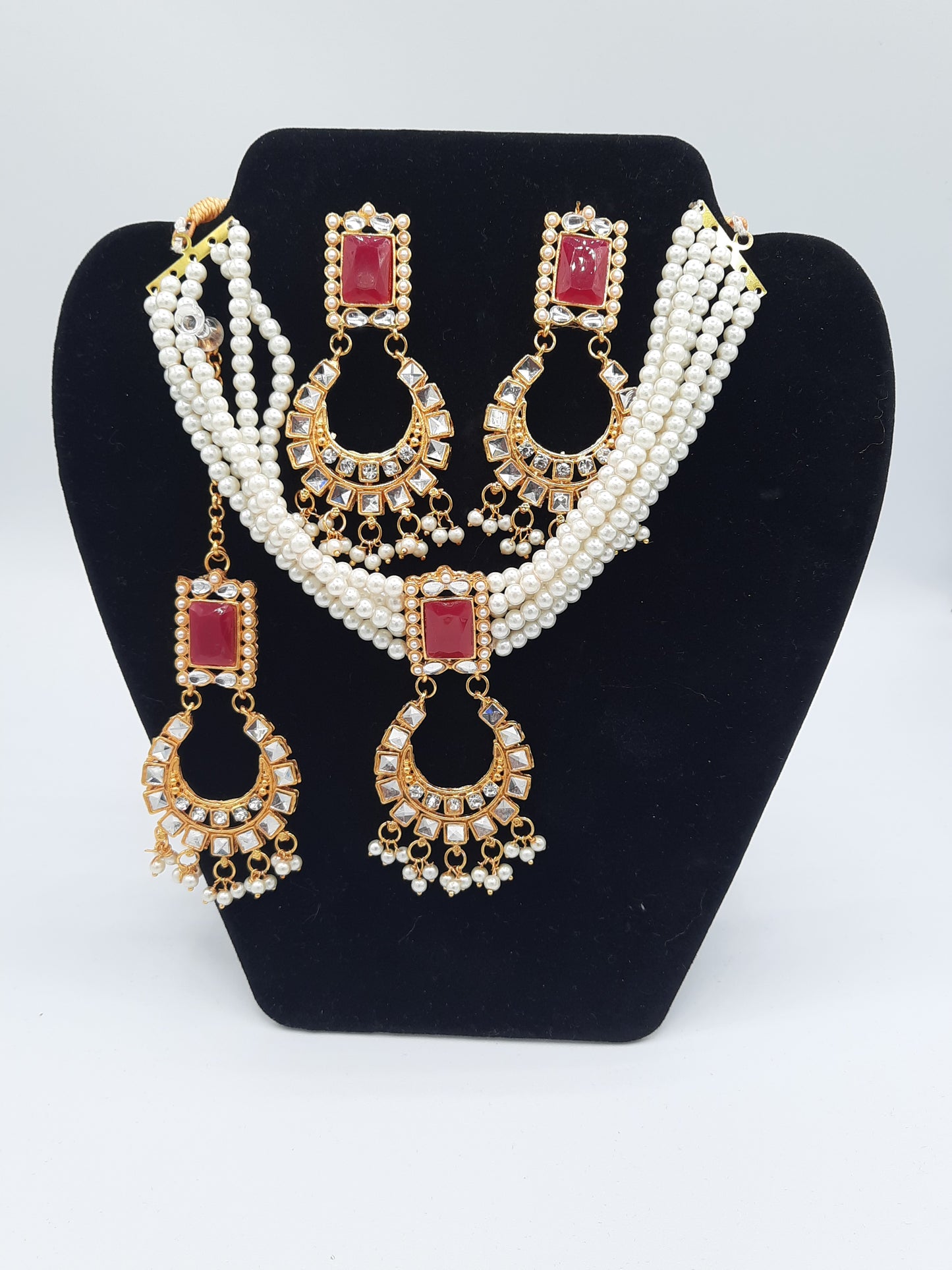 Guluband choker in pink and white colors with earrings and teeka