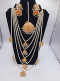 Bridal style kundan long mala with kundan jhumka and kundan teeka