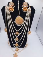 Bridal style kundan long mala with kundan jhumka and kundan teeka