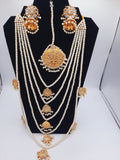 Bridal style kundan long mala with kundan jhumka and kundan teeka
