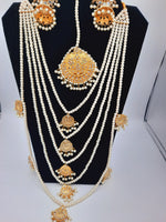 Bridal style kundan long mala with kundan jhumka and kundan teeka