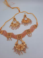 Pink guluband choker with earrings and teeka