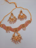 Pink guluband choker with earrings and teeka
