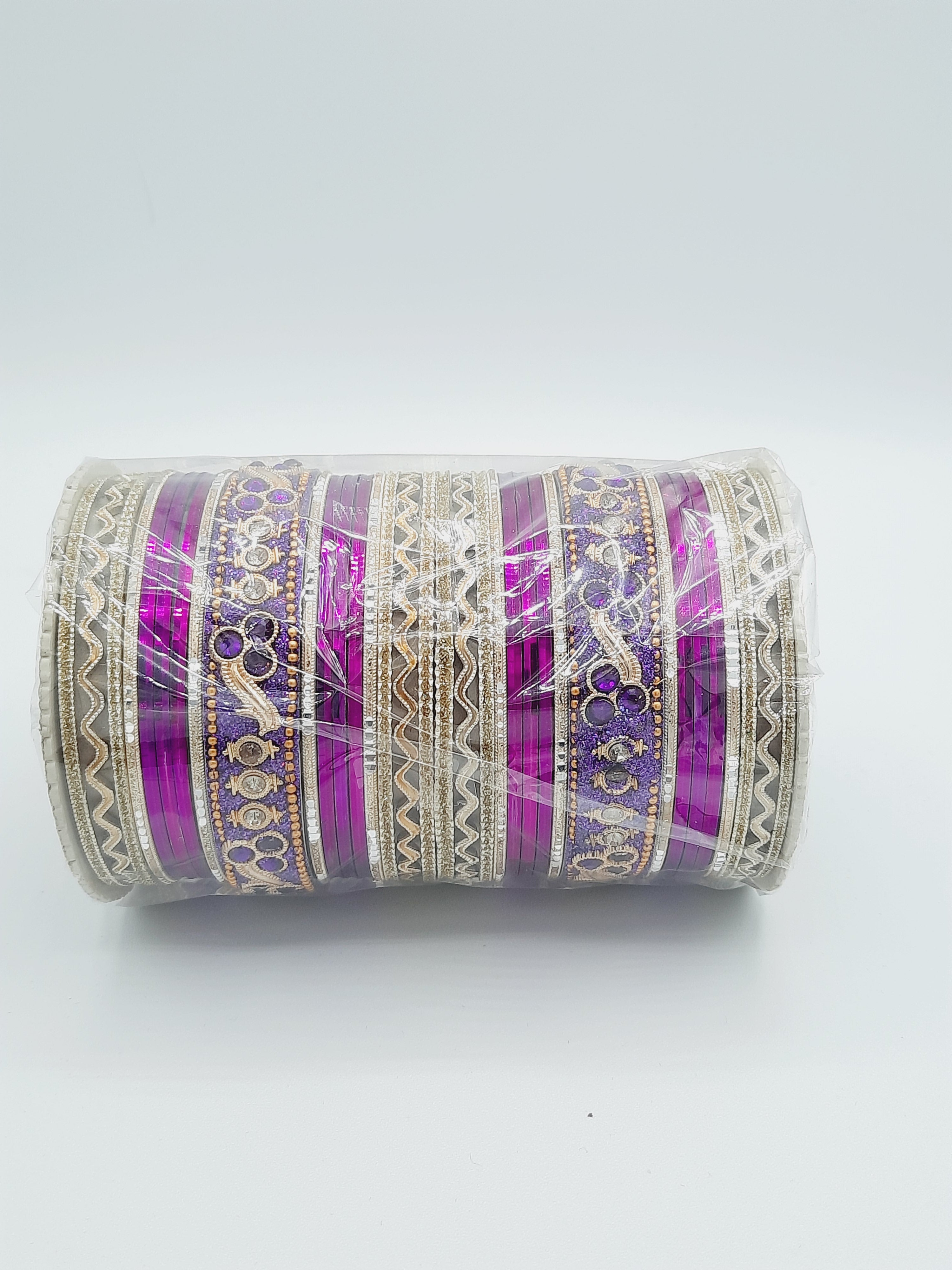 Bangles size 2.40 dia in shade of shiny purple glass bangles adorned with golden embellished kadas with purple embellishments - NATASHAHS