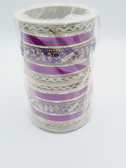 Bangles size 2.40 dia in shade of shiny purple glass bangles adorned with golden embellished kadas with purple embellishments - NATASHAHS