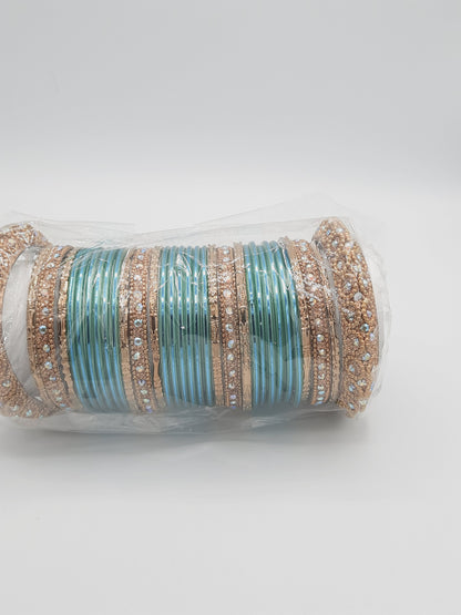 Bangles size 2.50 dia in shade of shiny aqua marine blue decorated with golden embellished kadas - NATASHAHS