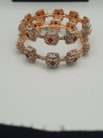 A pair of 2 Bangle 2.80 size in shades of golden and red - NATASHAHS