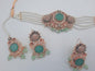 Anarkali Zircon choker set with guluband earrings and teeka in green color - NATASHAHS