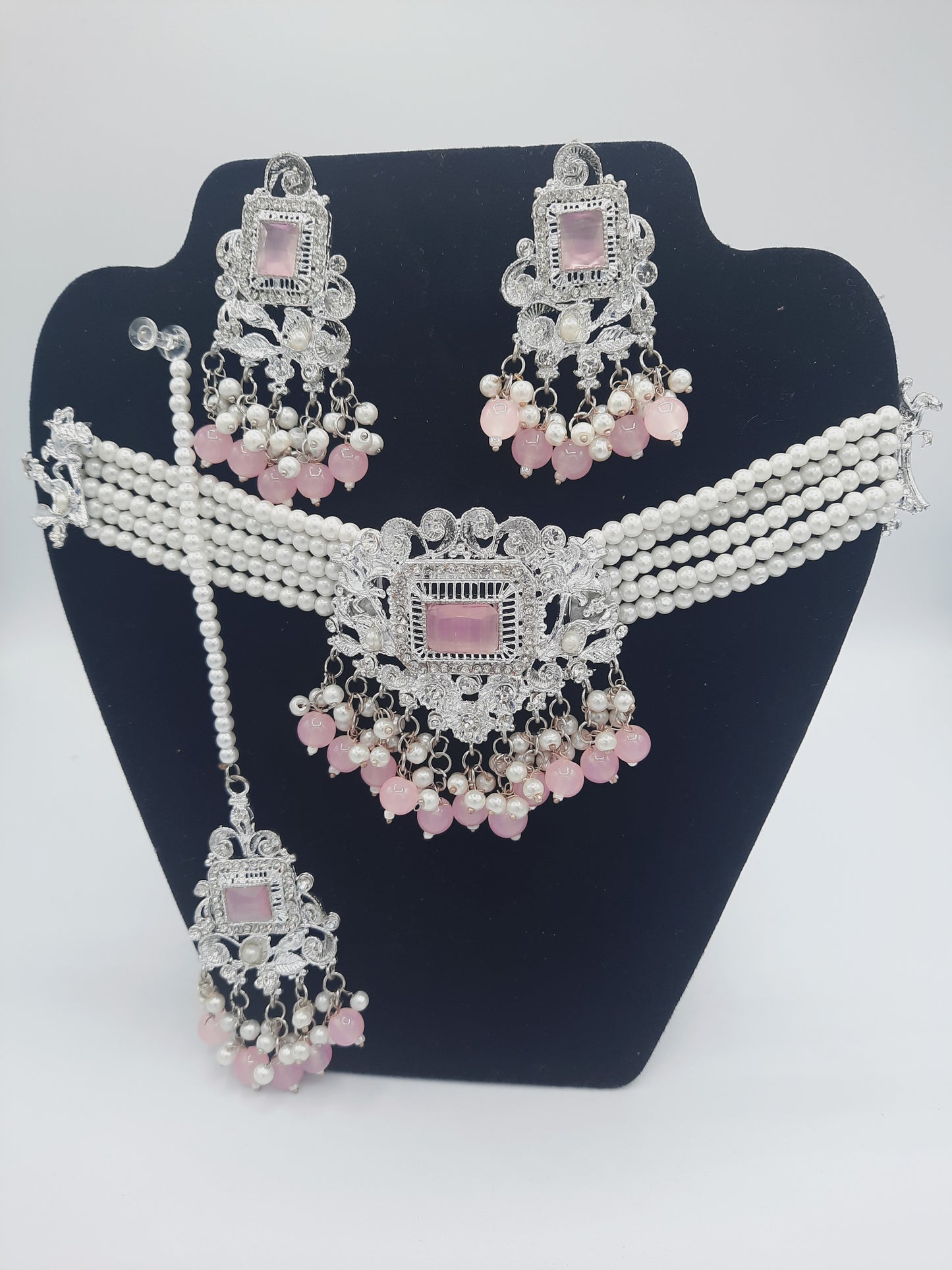 Anarkali Zircon choker set with guluband earrings and teeka in pink color in silver tone - NATASHAHS
