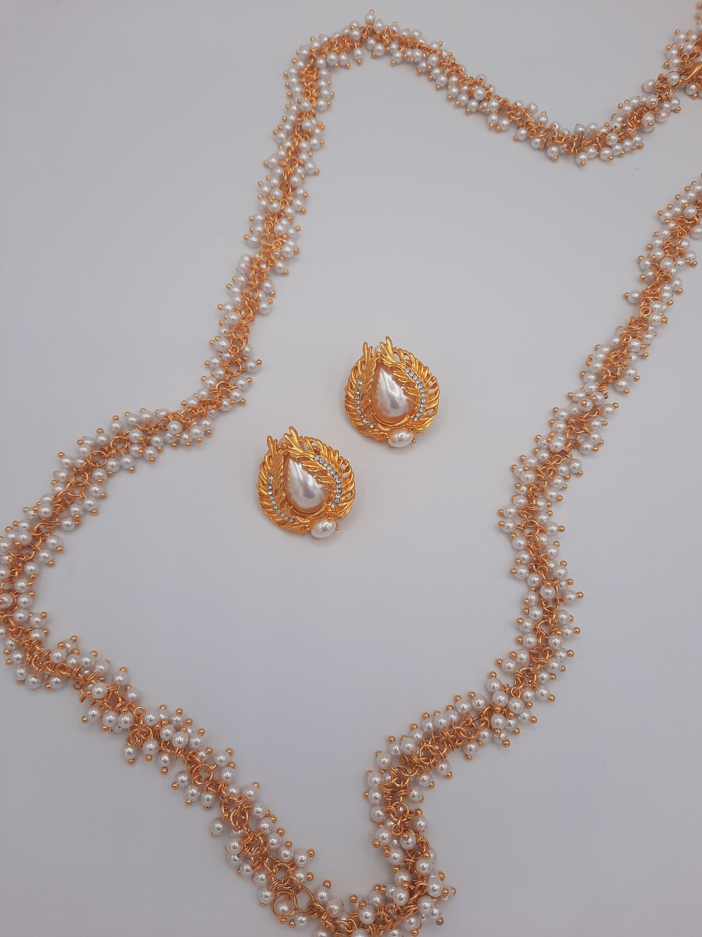 Gold-plated imitation white pearls gajra maala with dubai gold plated earrings - NATASHAHS