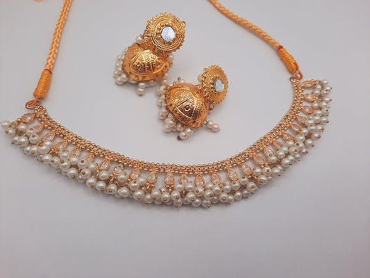 Gold-plated imitation jhumkas with white pearls and white pearls and kundan work necklace - NATASHAHS