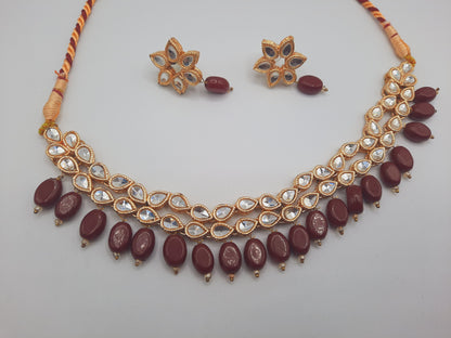 Flower shape gold plated kundan adjustable necklace with earrings in red and green color - NATASHAHS
