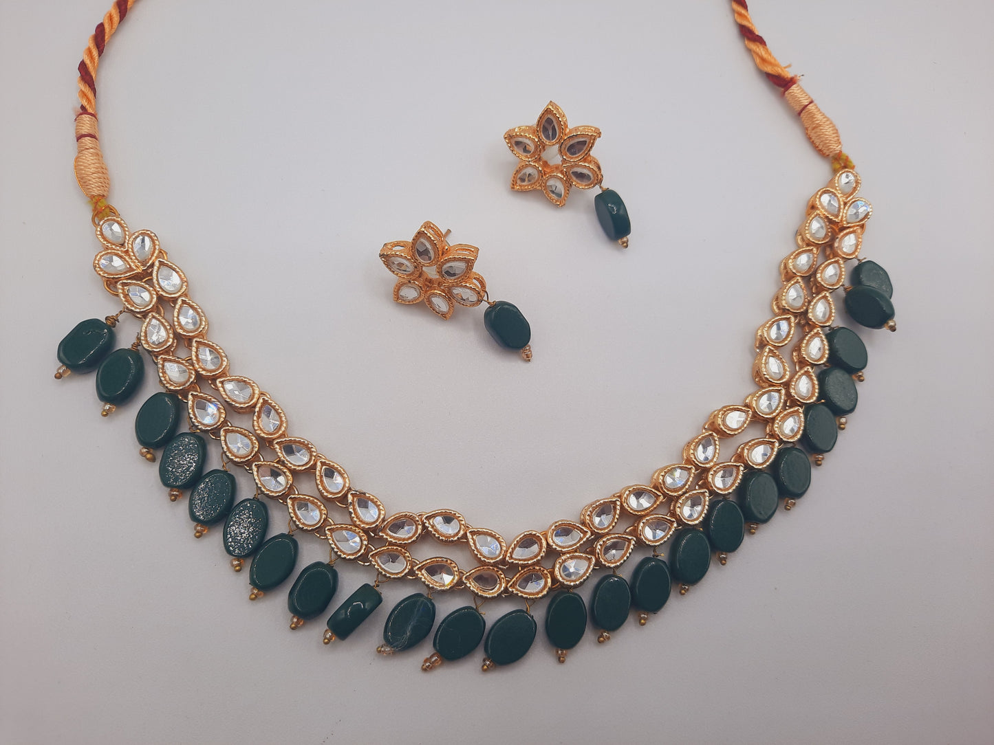 Flower shape gold plated kundan adjustable necklace with earrings in red and green color - NATASHAHS