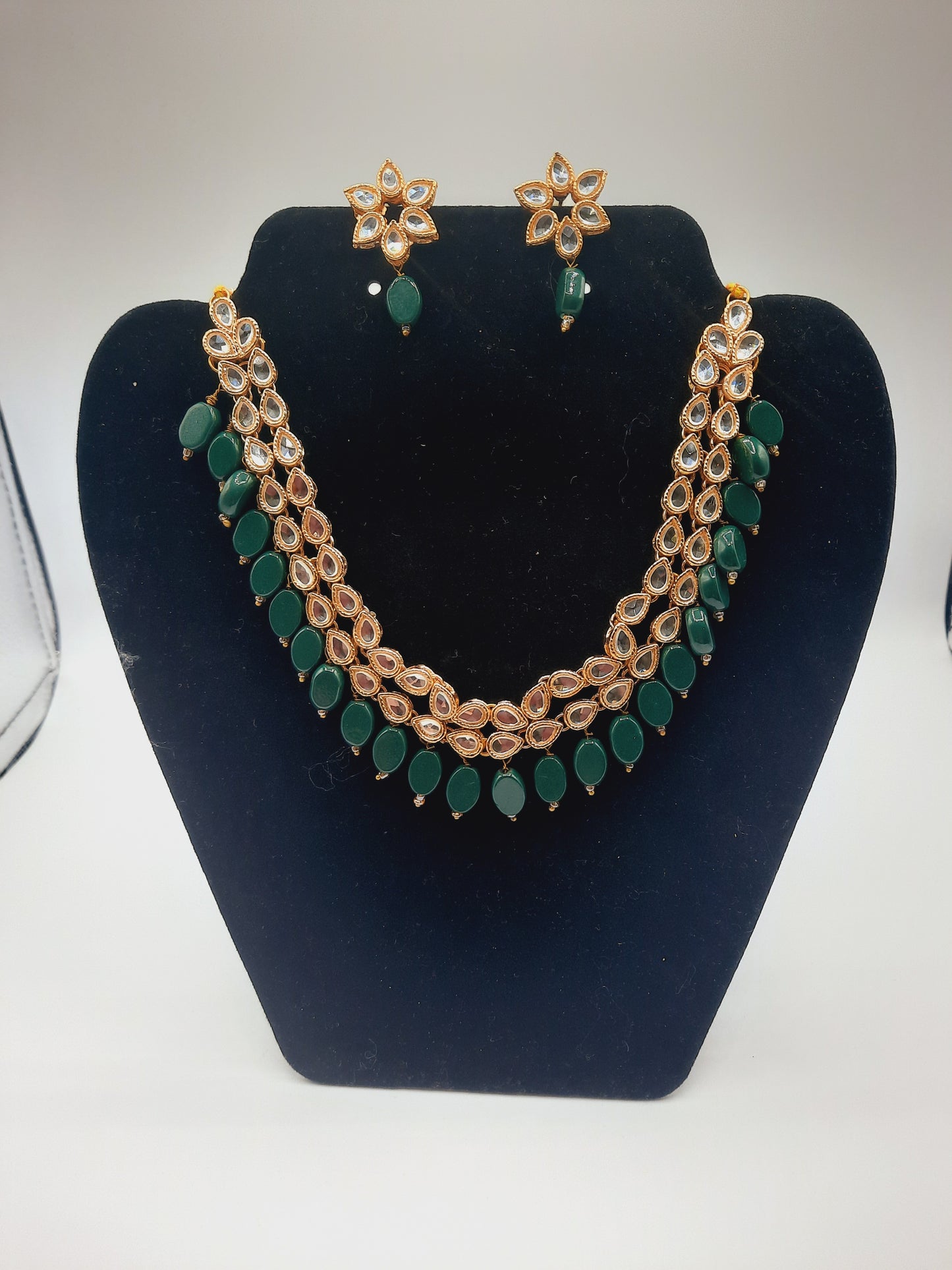 Flower shape gold plated kundan adjustable necklace with earrings in red and green color - NATASHAHS