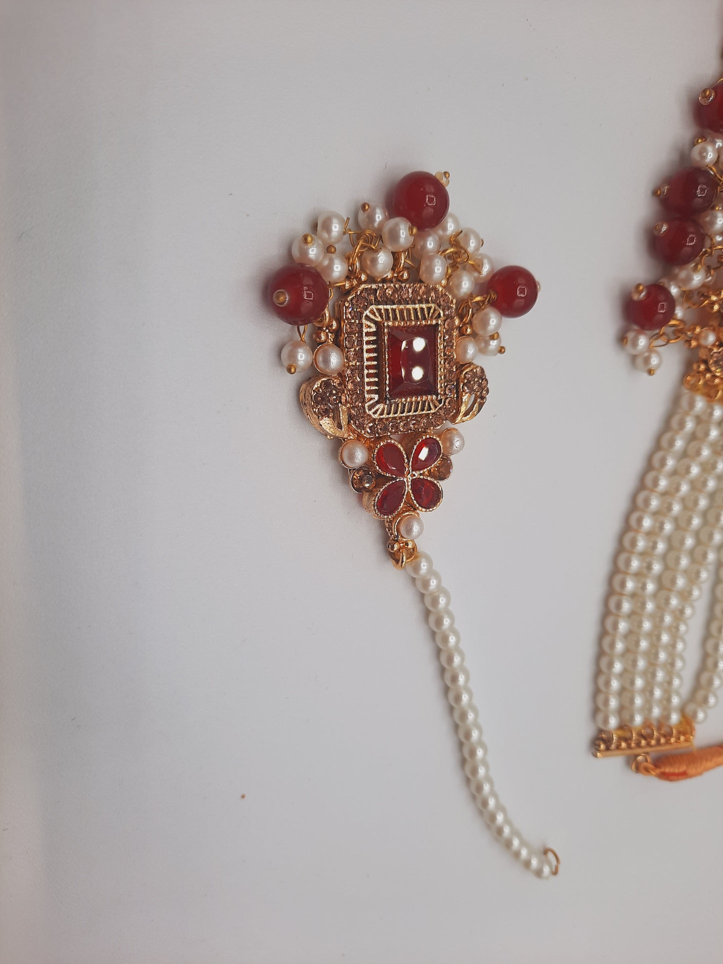 Anarkali choker set with guluband earrings and teeka in red color with gold plated tone - NATASHAHS