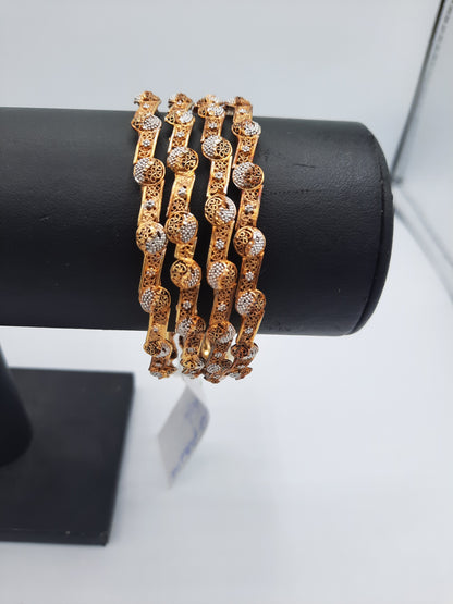 Set of 4 gold polished bangles with touch of silve tone mix sixe of 2.50 dia - NATASHAHS