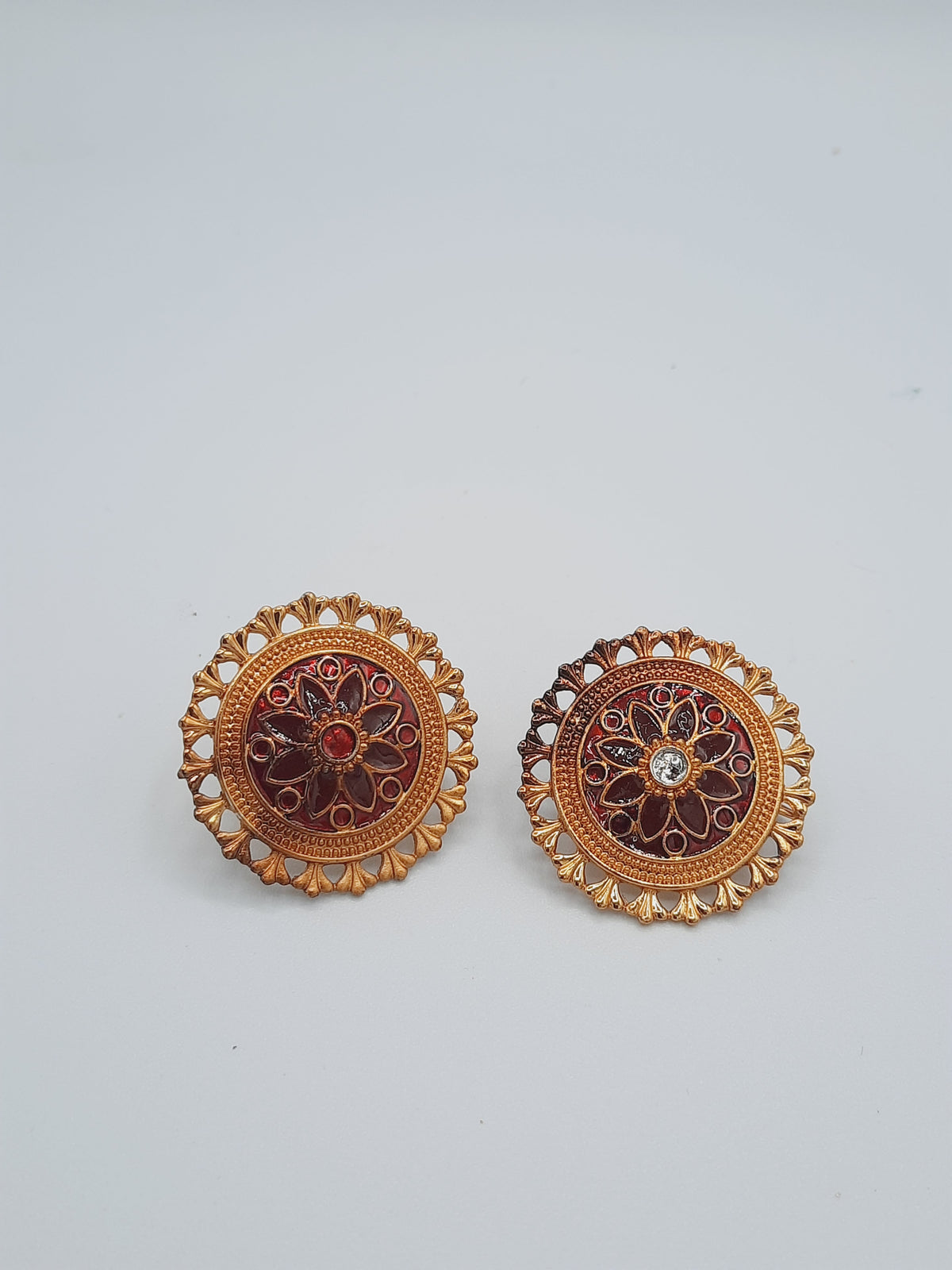 Golden circular shaped with colorful meena