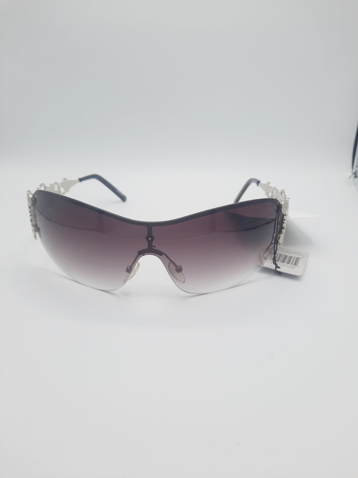 Designer fashion sunglasses with a distinctive decorative design