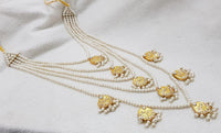 Bridal style kundan long mala with kundan jhumka and kundan teeka