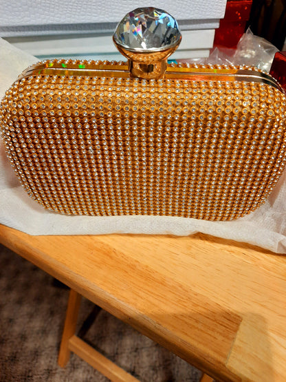 Golden clutch for weddings and parties with golden chain and diamontees