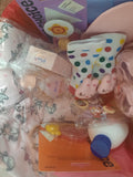 Baby shower gift basket for baby girl