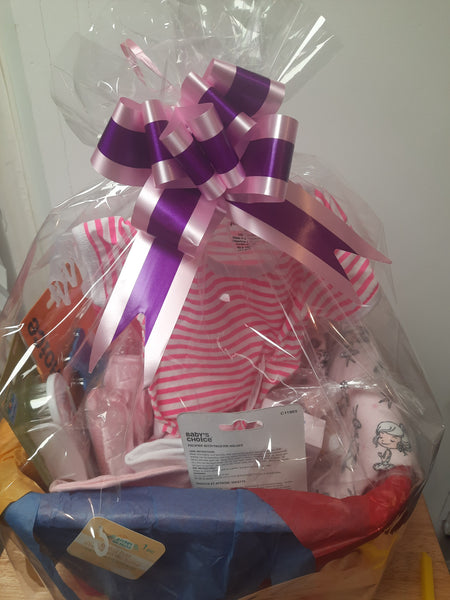 Baby shower gift basket for baby girl
